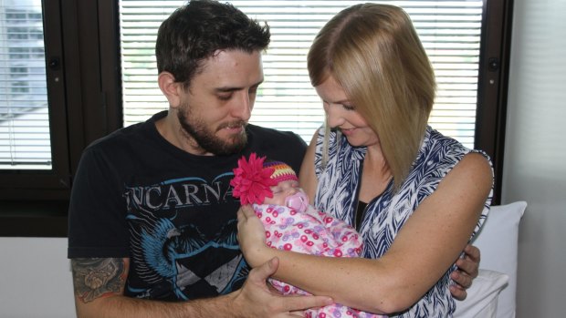 Mia with her parents: Mia suffered a heart attack caused by a narrowing of her aorta.