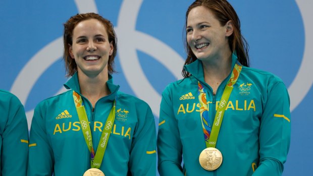 Golden pair: Bronte and Cate Campbell pose with their 4x100m freestyle relay medals.