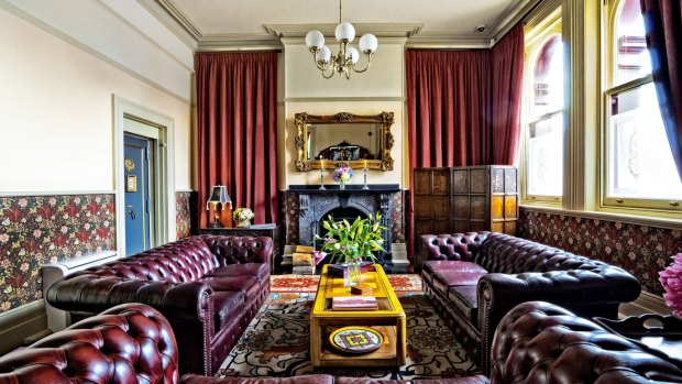 Guests at the Old Bank Boutique Hotel can relax in the dramatic lounge  and library that dominate the front of the building.  