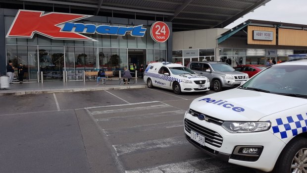 Police at the Kmart store in Burwood after a possible bomb scare.