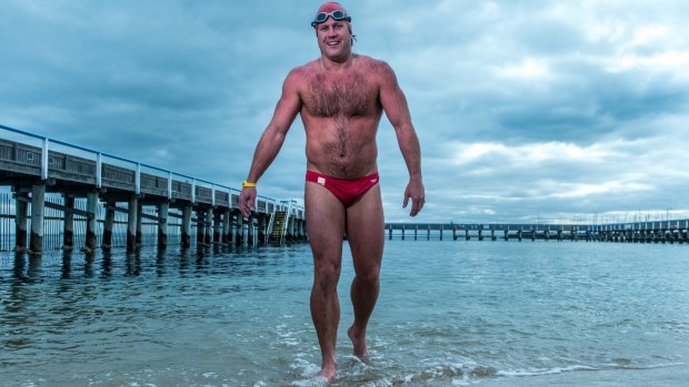 Former AFL player Campbell Brown, who will attempt to swim the English Channel this weekend, training at Brighton Beach.