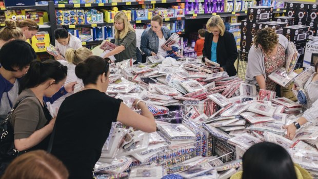 Mothers queued outside Aldi stores on to get their hands on Collette Dinnigan's clothing range for girls.