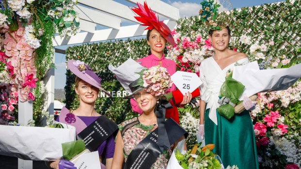 Fashions on the field runner up Emma Wells and winner Aimee Hay; millinery winner Lucy Hoolihan and runner up Viviana Croker. Photo: Sitthixay Ditthavong.
