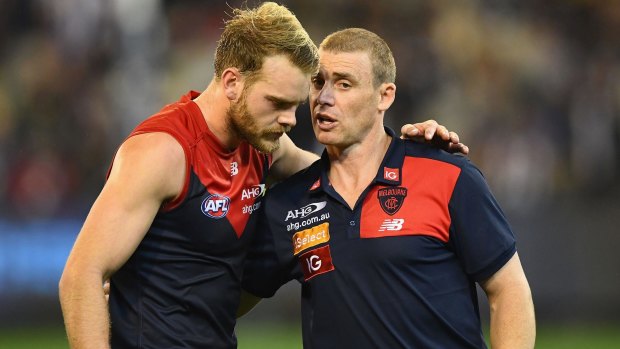 Jack Watts of the Demons talks to Demons head coach Simon Goodwin during their win over the Pies on Queen's Birthday. 