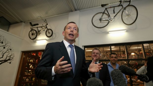 Prime Minister Tony Abbott and Small Business Minister Bruce Billson during a visit to Celestino Cafe in Fyshwick on Wednesday 27 May 2015. Photo: Alex Ellinghausen