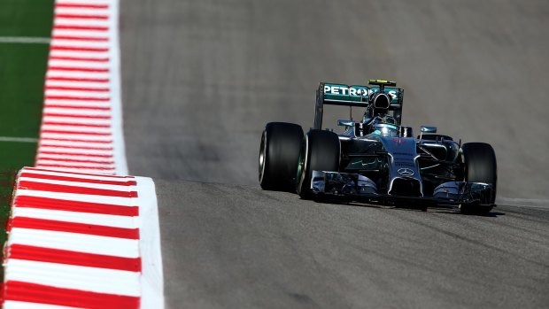 Nico Rosberg held off teammate Lewis Hamilton to claim pole.