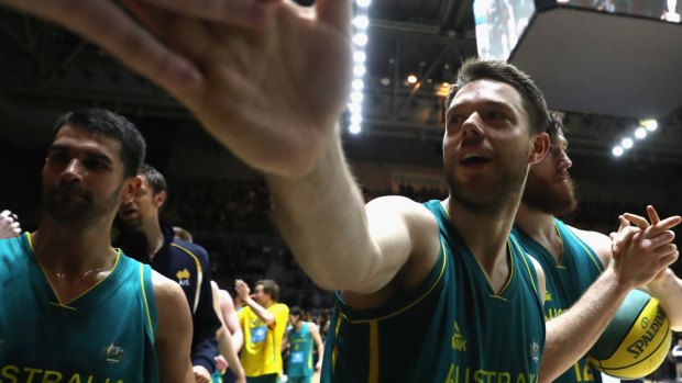 Matthew Dellavedova, of the Boomers, acknowledges a fan after the match against the Pac-12 College All-stars at Hisense Arena.