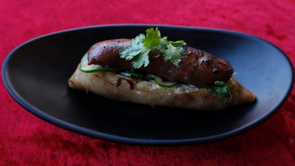 Master Chicken's Taiwanese sausage with sticky rice and toppings.