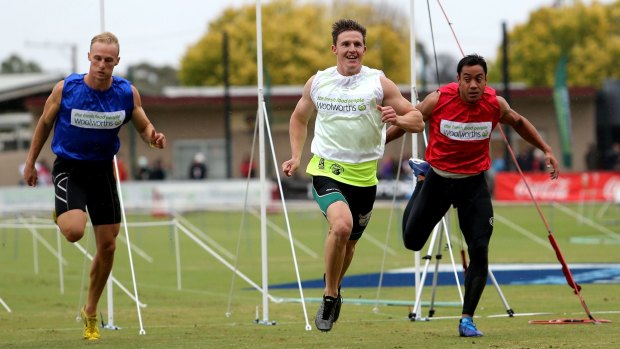 Murray Goodwin (white) wins  the final of The Stawell Gift on Monday.