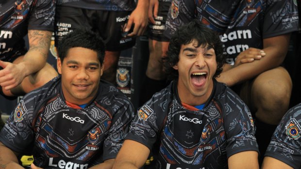 Among his own: Johnathan Thurston with Indigenous All Stars teammate Chris Sandow before the 2012 game. 