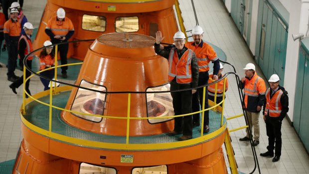 Prime Minister Malcolm Turnbull views a generator during his tour of the Snowy Hydro Tumut 2 power station on Monday.