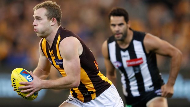 Tom Mitchell on the burst for the Hawks.