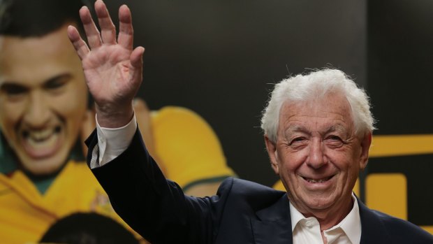 Ambitious: FFA chairman Frank Lowy acknowledges fans during celebrations on Sunday. He is now targeting further progress in major tournaments.