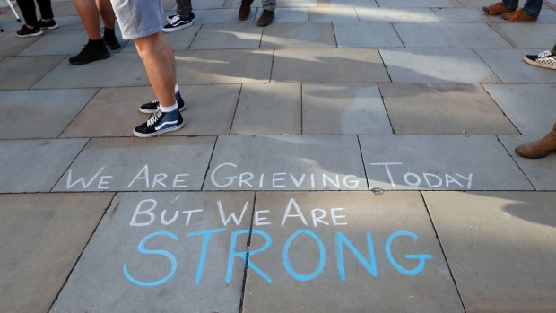 A message is written on the pavement in Manchester.