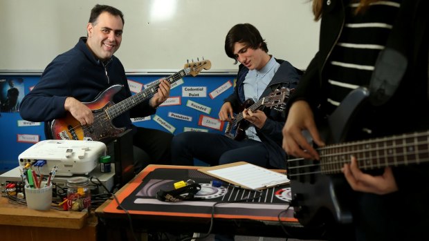 Leader of the band: Sandringham College director of music Ben Pisani practises with VCE music student Angus Moller. The school runs an extensive music program.