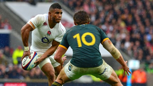 English still no match for the big two: Kyle Eastmond looks to draw and pass for England.