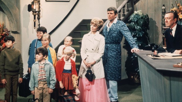 Florence Henderson with her on-screen family in <i>The Brady Bunch.</i>