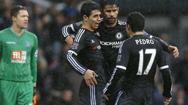 Spat: Oscar (left) and Diego Costa (middle), pictured against Crystal Palace last weekend.
