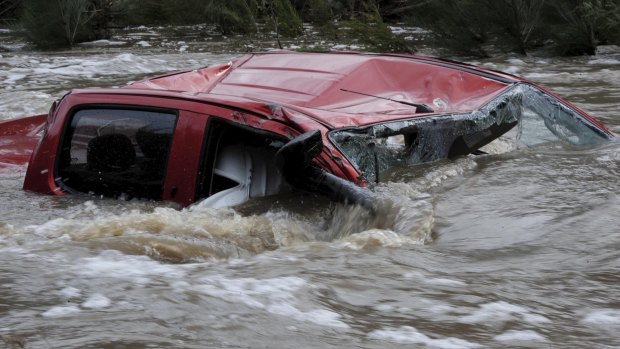 The driver of the twin cab four wheel drive vehicle died when it was swept away in Paddy's river.