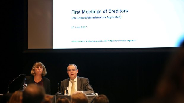 Administrators from KordaMentha address creditors at the first meeting in Sydney. 