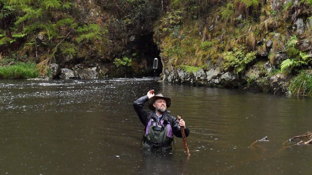 Christian Taylor in front of Big Peninsula tunnel, which miners dug to divert the Yarra through so they could comb the river bed for gold in the 1860s.  