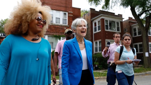 Green Party presidential candidate Jill Stein, centre, has asked for recounts, citing hacking concerns.