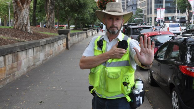 Ranger Phill McGill tests out the new body cameras being rolled out by the city of Sydney.