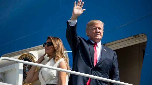 President Donald Trump and first lady Melania Trump arrive in Hawaii on Friday on their way to Asia.