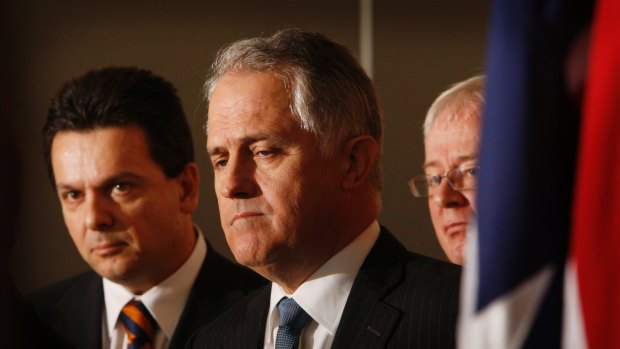 Then Opposition Leader Malcolm Turnbull stands with Nick Xenophon and Andrew Robb on August 10, 2009, to  launch the emissions intensity report from Frontier Economics that he backed until a few months ago. 