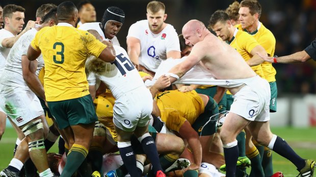 Plenty of niggle: England prop Dan Cole had his shirt ripped off in a first-half scuffle.