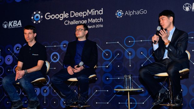 South Korean professional Go player Lee Se-dol, right, attends a press conference after the match against Google's artificial intelligence program, AlphaGo.