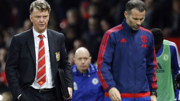 Tough gig: Manchester United's manager Louis van Gaal, left, and his assistant Ryan Giggs.
