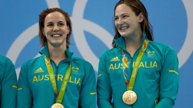 Golden pair: Bronte and Cate Campbell pose with their 4x100m freestyle relay medals.