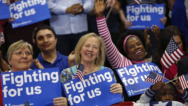Supporters of Hillary Clinton cheer her victory.