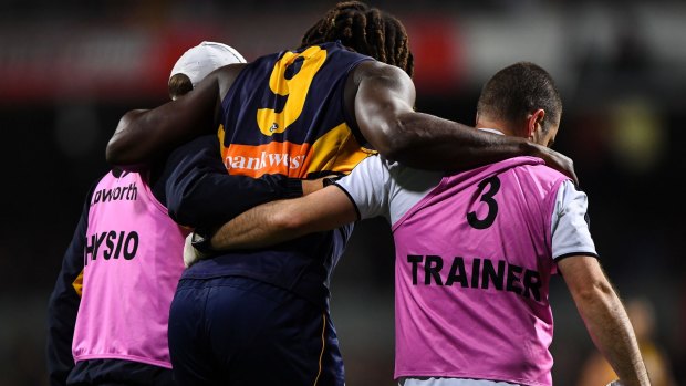 Nic Naitanui could return in 10 months with a 'hybrid' operation.