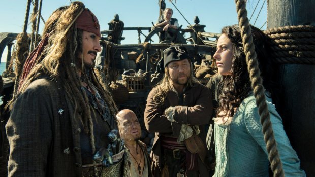Johnny Depp as Jack Sparrow, left, confronts Kaya Scodelario's Carina Smyth, right, in a scene from Pirates of the Caribbean: Dead Men Tell No Tales.