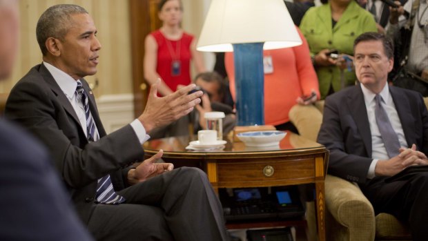 President Barack Obama, left, with FBI Director James Comey, right.