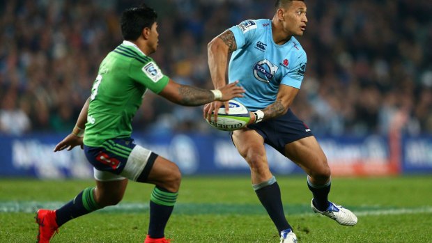 Sticking around: Israel Folau.