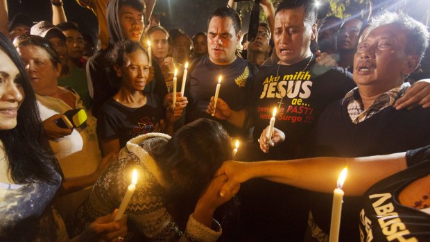 A midnight candlelight vigil held in Cilacap.