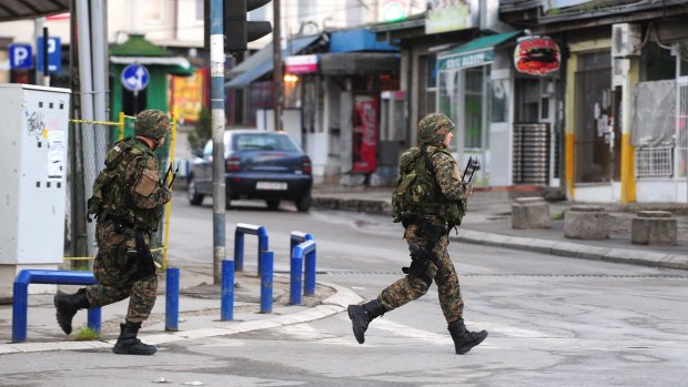 Armed officers in the streets of Kumanovo during the clashes.
