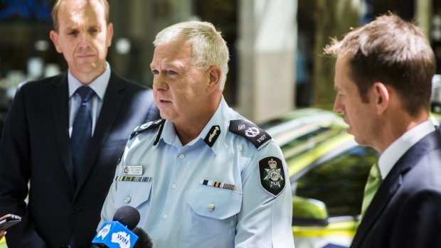 Chief Police Officer Rudi Lammers, with ministers Simon Corbell and Shane Rattenbury: Police are looking only at whether there was criminal conduct.