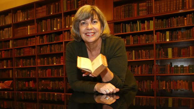 State Library of NSW's rare book expert, Maggie Patton, with the Bandello translation.