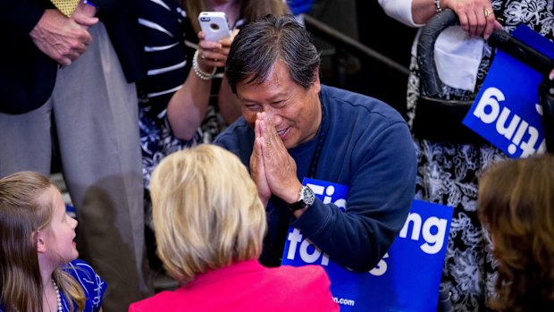 A supporter greets Democratic presidential candidate Hillary Clinton in Kentucky, on Monday.