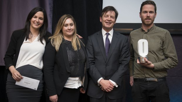 Age reporters Tammy Mills, Rania Spooner and Adam Carey (far right) with Road Safety Minister Luke Donnellan at the Towards Zero Road Safety Media Awards.