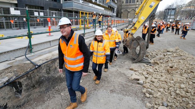 Premier Daniel Andrews tours the City Square in July for early works for the Metro Rail tunnel. 