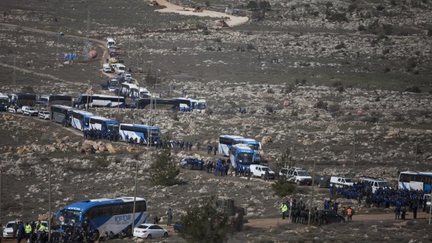 Israeli security forces arrive to evacuate the settlement.