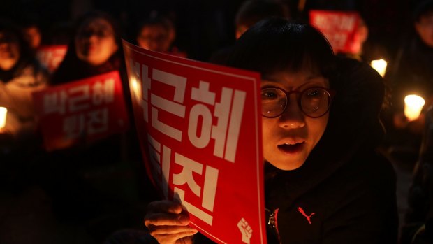 Protesters call for South Korean President Park Geun-Hye to step down on Thursday.