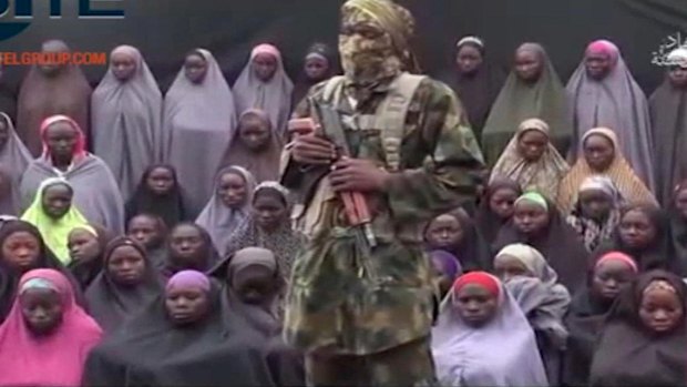 The latest video shows an alleged Boko Haram soldier standing in front of the girls, alleged to be some of the 276 abducted in Chibok in April 2014.