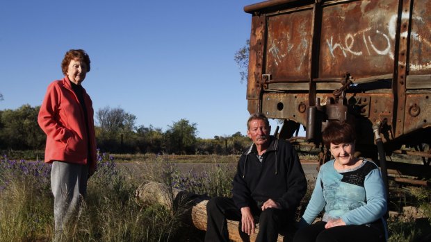 Siblings Lorraine Cole, Barry "Fred" Cowie and Peggy Corney visit the site of the Broken Hill picnic train attack where their aunt, Alma Cowie was shot dead in 1915.