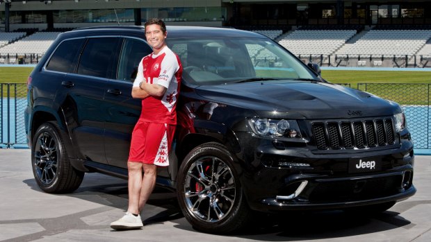 Soccer player Harry Kewell with his Jeep.